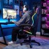 Silla Gamer HTI Ergonómica Luces RGB Apoyapíes Parlantes Neg